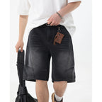 Kaelo Wide-Leg Distressed Denim Shorts