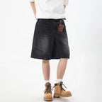 Kaelo Wide-Leg Distressed Denim Shorts